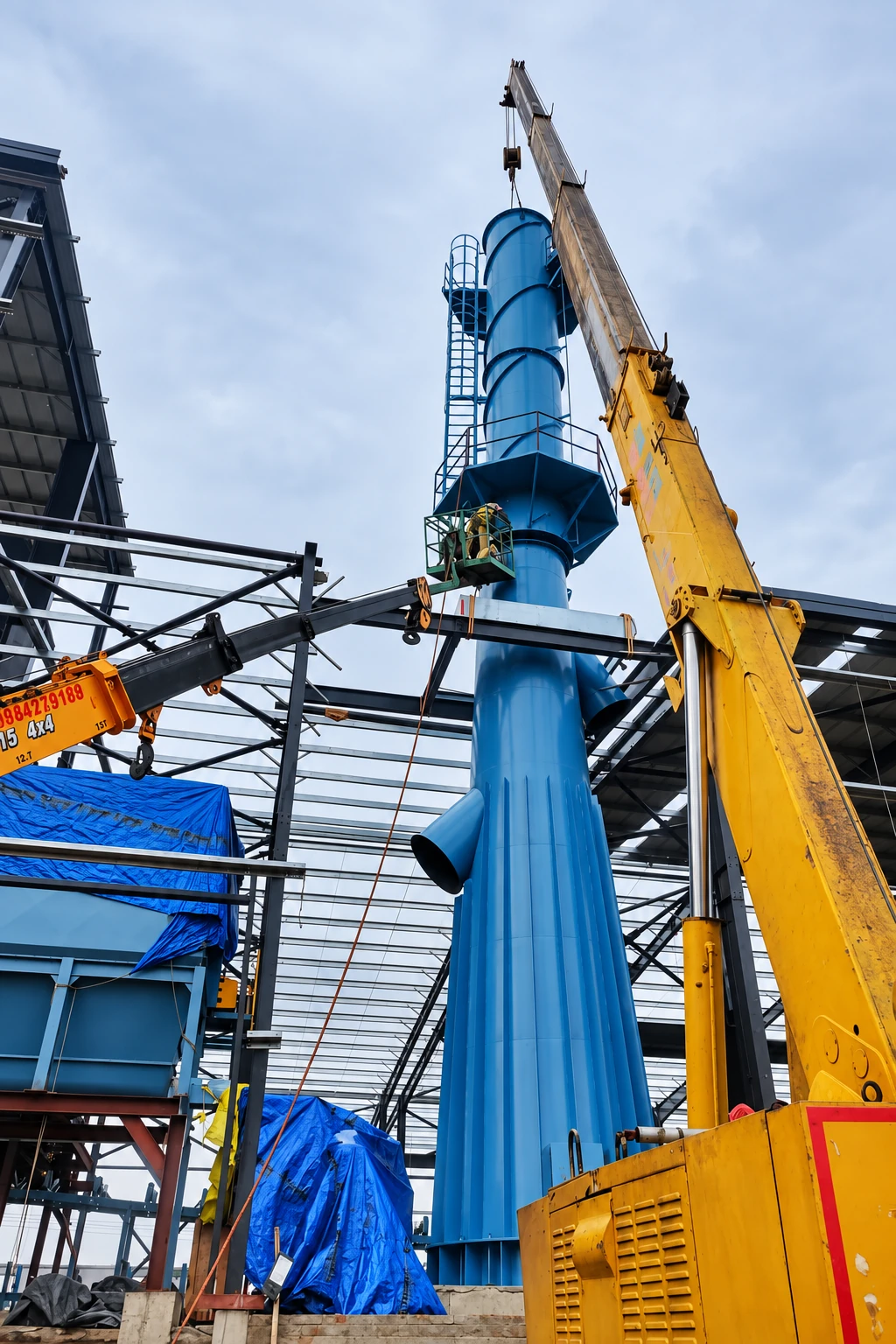 Extraction stack and associated equipment being installed at JS Auto Cast Foundry.